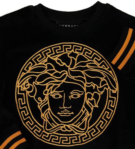 Gold Versace Logo