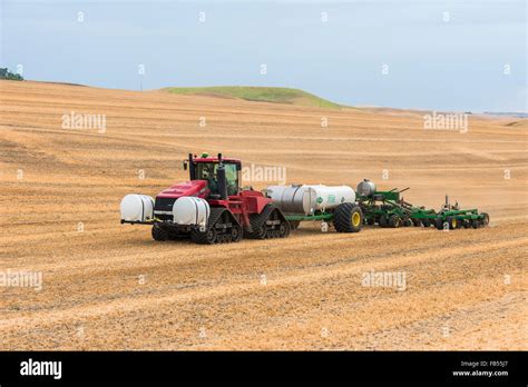 Case Quadtrac Tractor Pulling An Anhydrous Ammonia Tank And Applicator
