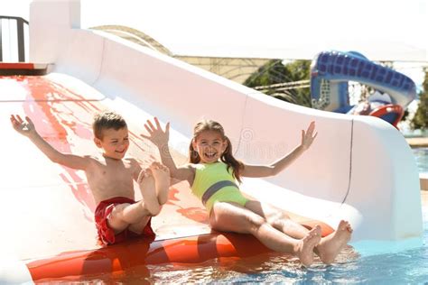 Children on Slide at Water Park. Summer Vacation Stock Photo - Image of ...