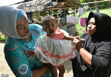 Indonesian Girl Howls Through Circumcision As Debate Heats Up Daily