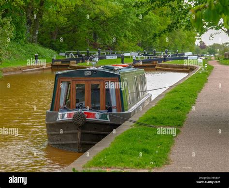 Mooring Narrowboat On The Trent And Mersey Canal In Front Of The Red