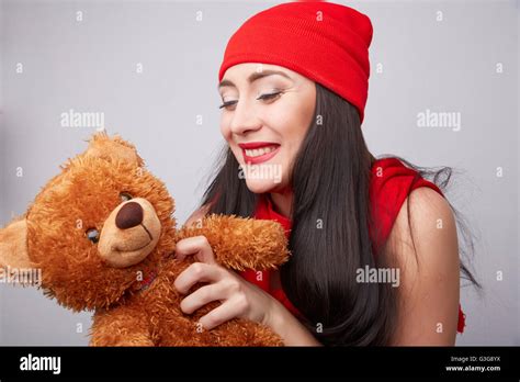 Brunette With A Teddy Bear Stock Photo Alamy