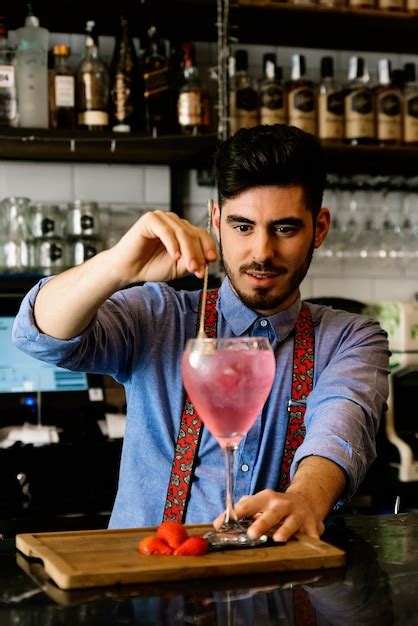 Premium Photo Expert Barman Is Making Cocktail At Night Club