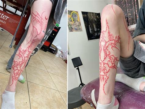 Grimes Gets Full Length Leg Tattoo In Red Ink