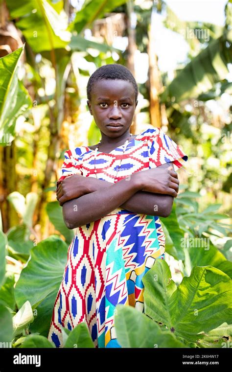 Girl In A Beautiful African Fabric Dress In Uganda East Africa Stock