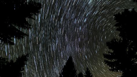 Stars Move Around A Polar Star Time Lapse Of Star Trails In The Night