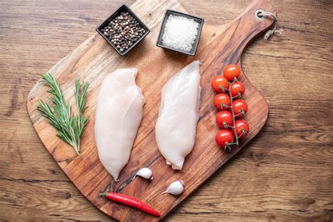 Premium Photo Raw Chicken Fillet On Wooden Background