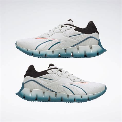 Zig Dynamica 4 Shoes In Pure Grey 1orange Flaresteely Blue S23 R