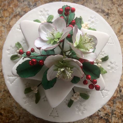 Christmas Cake With Christmas Roses Mistletoe And Red Berries