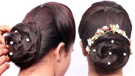 New French Bun Hairstyle With Using Clutcher Beautiful Hairstyle