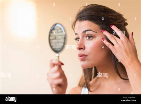 Woman Looking In Mirror Hi Res Stock Photography And Images Alamy