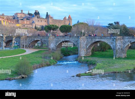 View Of The Medieval Citadel And Bridge Over River Aude In Carcassonne