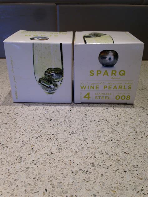 Sparq Wine Pearls 4 stainless steal pearls. Freeze and serve in white wine, rose, or champagne ...