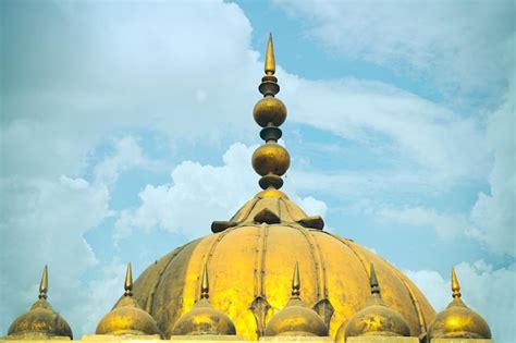 Premium Photo | A golden tomb of islamic mosque