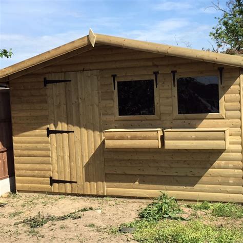 12 X 10 Fully Tanalised 19mm T G Loglap Summerhouse 18 Canopy