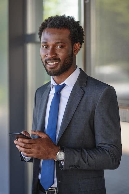 Premium Photo Handsome Cheerful African American Businessman Smiling