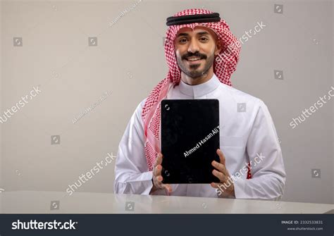 Saudi Man Holding Laptop Computer Images Stock Photos Vectors