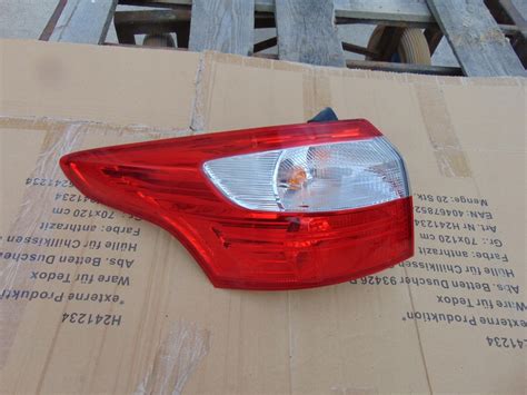 LAMPA TYLNA W BŁOTNIK LEWA FORD FOCUS MK3 KOMBI 12887972991