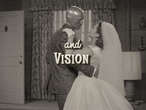 a man and woman dressed up in wedding attire standing next to each other with the word vision on ...