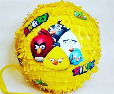 The Angry Birds Pinata Is Yellow And Has Various Characters On It