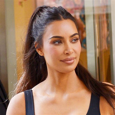 Kim Kardashian Flaunts Her Iconic Curves In An Unzipped Swimsuit Top On