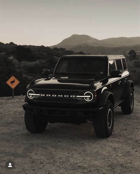 Black Truck In A Scenic Dirt Field