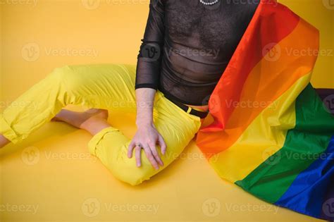 Handsome Young Man With Pride Movement Lgbt Rainbow Flag On Shoulder Against White Background