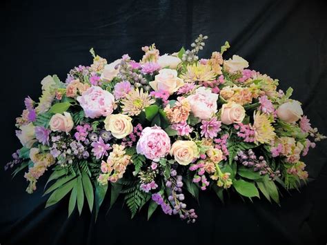 Lovely Casket Spray Of Pastel Flowers Funeral Floral Arrangements