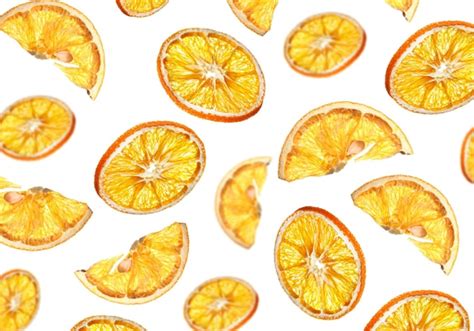 Muchas Rodajas De Naranja Secas Cayendo Sobre Fondo Blanco Foto Premium