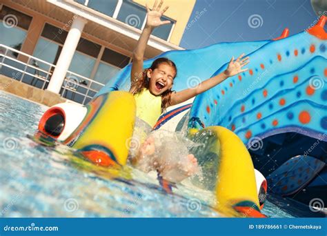 Happy Girl On Slide At Water Park Summer Stock Image Image Of Slide Recreation 189786661