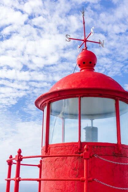 Premium Photo | Bright red lighthouse in nazare