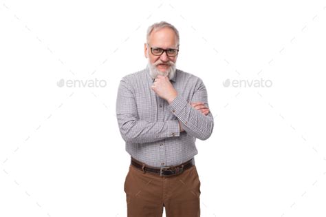 Handsome Gray Haired Mature Businessman With A Beard And Mustache In A