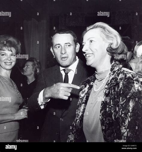 JOEY BISHOP with wife at CBS party.Supplied by Photos inc.(Credit Stock ...