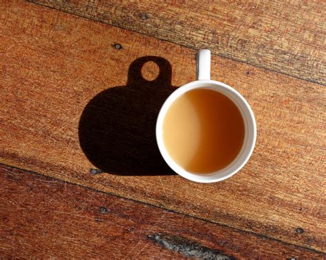 Wooden Cup Shadow Photograph By Lauren Rathvon