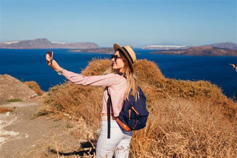 Hiker Woman Walks On Santorini Island Greece Enjoying Landscape Happy