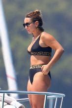 Sam Faiers Showing Off Her Toned Physique In A Plunging Black Versace Bikini During Luxury Trip