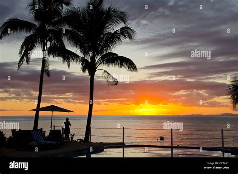 Paradise Tavenui Resort Woman Silhouette At Swimming Pool At Sunset