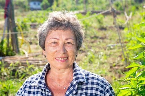 Portrait Of Mature Woman In Garden On Day Stock Photo Image Of Woman Leisure