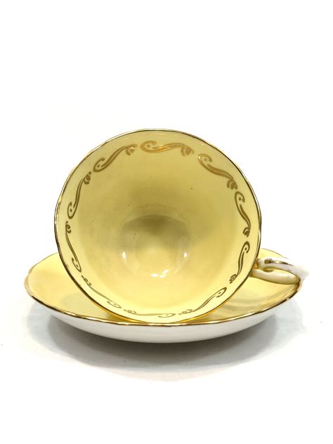 Vintage Bright Yellow Tea Cup Saucer Gilded Handle Rims Tuscan