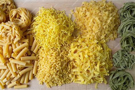 Premium Photo Layout Of Italian Raw Pasta Different Types And Shapes