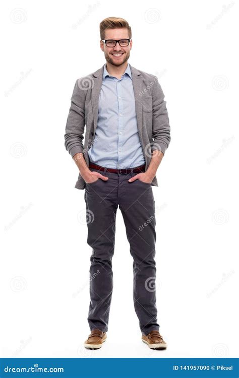 Young Man Standing With His Hands In Pockets Stock Photo Image Of