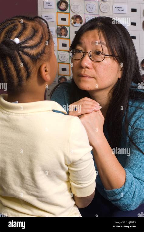 Education Preschool Classroom 4 5 Year Olds Female Teacher Listening To