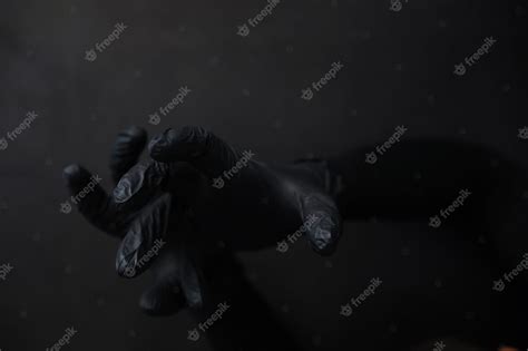 Premium Photo Background Of Hands In Gloves Black Gloves Hand