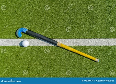 Field Hockey Stick and Ball on Green Grass Stock Image - Image of angle ...