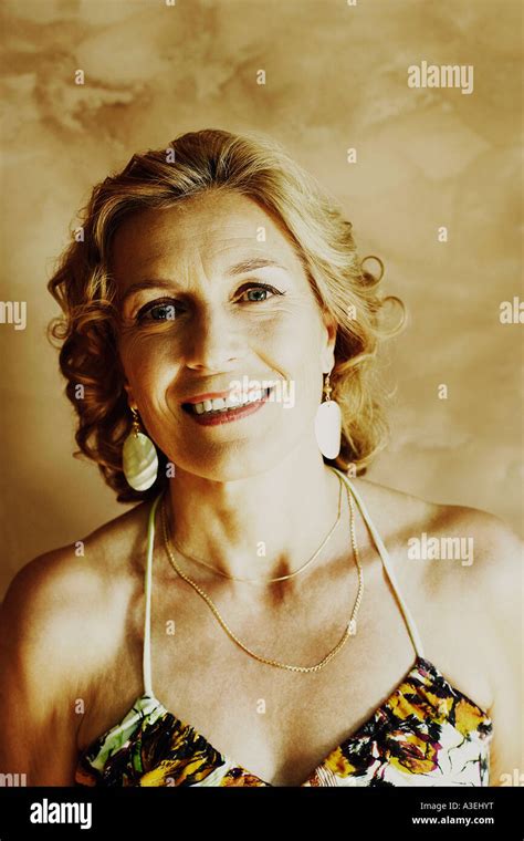 Portrait Of A Mature Woman Smiling Stock Photo Alamy