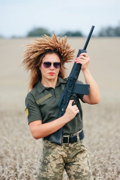 Premium Photo Female Soldier In Military Uniform A Girl In A Military