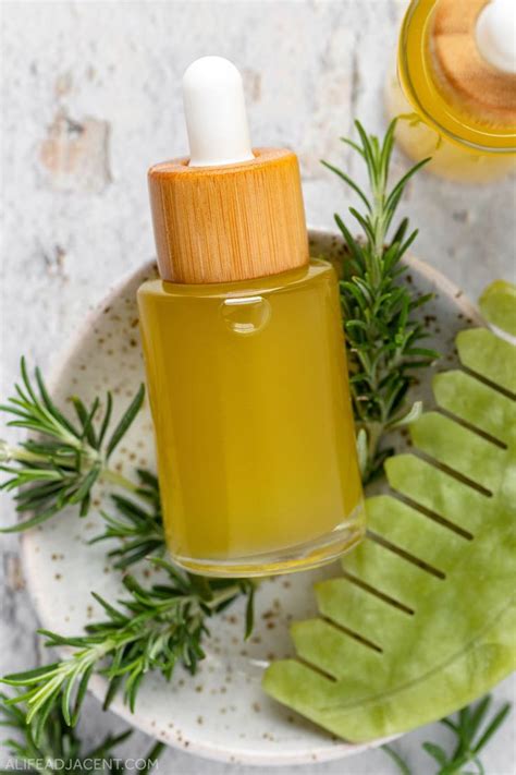 Homemade Rosemary Oil For Hair Growth With Text Overlay That Reads Diy