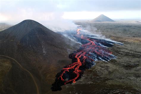 Orange Like The Sun Tourists Drawn To Iceland Volcano Despite Warnings