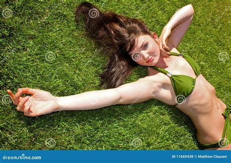 Bikini Model Lying Down On Grass Stock Photo Image Of Alone Head