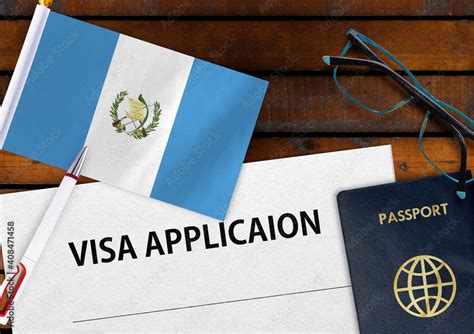 Flag Of Guatemala Visa Application Form And Passport On Table Stock